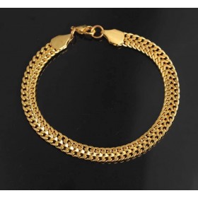 Bracelet 7 mm thick 23 cm long. Steel/gold