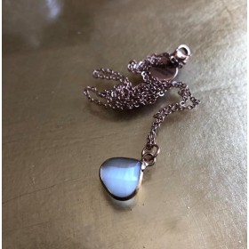 Moonstone pendant, including chain. Steel/red gold